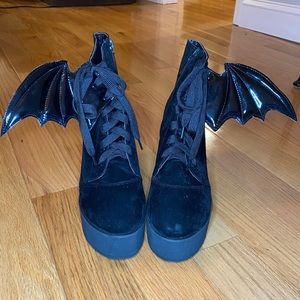 Iron Fist black suede batwing platform booties